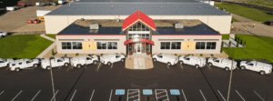 Holtz Builders Building with HBI Trucks parked in front