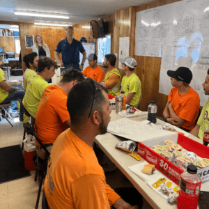 Tom and field crew having lunch at the Wilderness Cabins