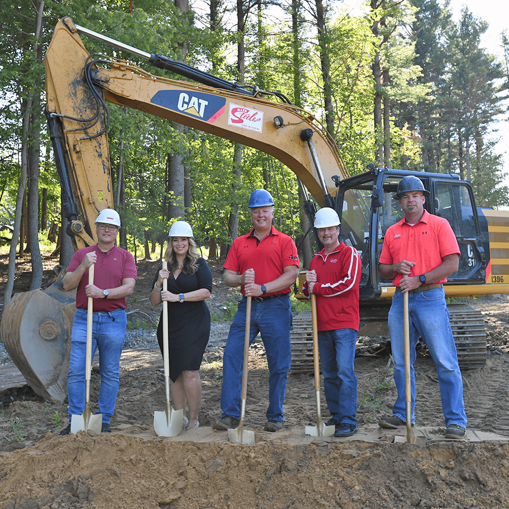 Exec Team breaks ground with shovels