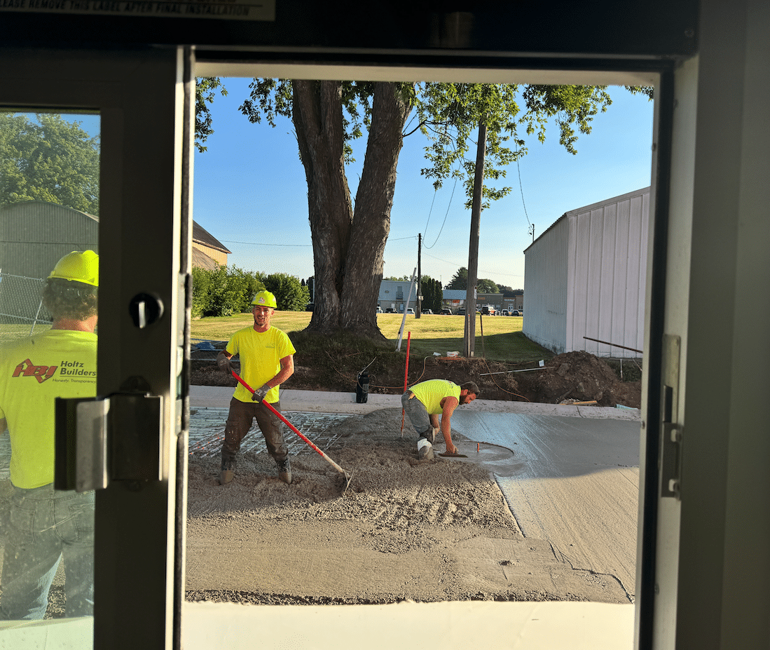 Tommy Car Wash BD | Holtz Builders | General Contractor HBI Team laying concrete