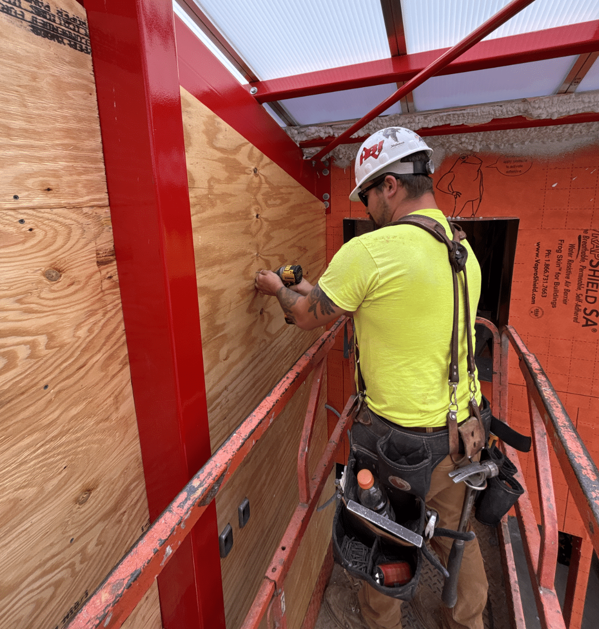 Tommys Car Wash BD | Holtz Builders | General Contractor Installing Plywood